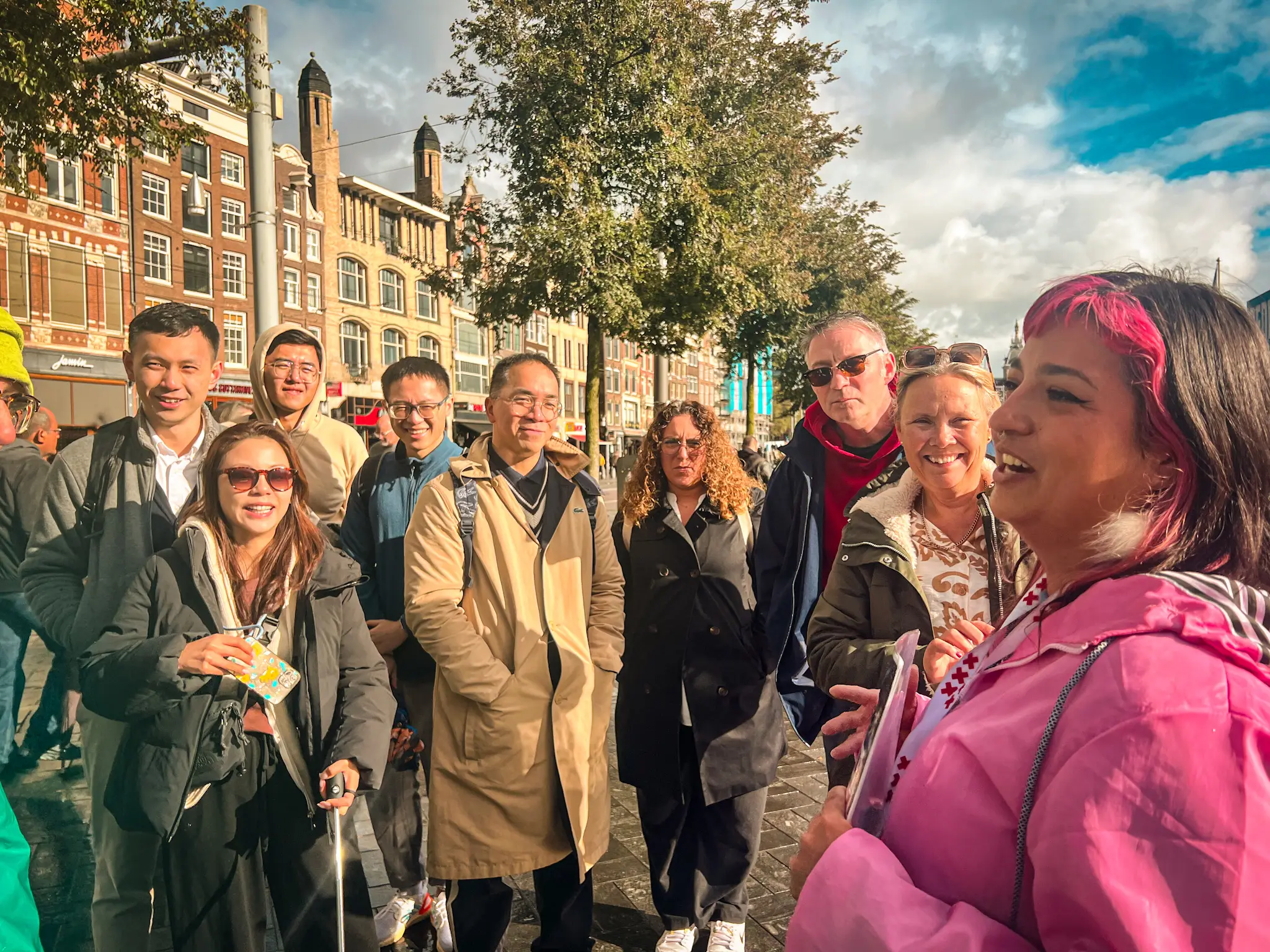 Hello Amsterdam Walking Tour Guide explaining Damrak
