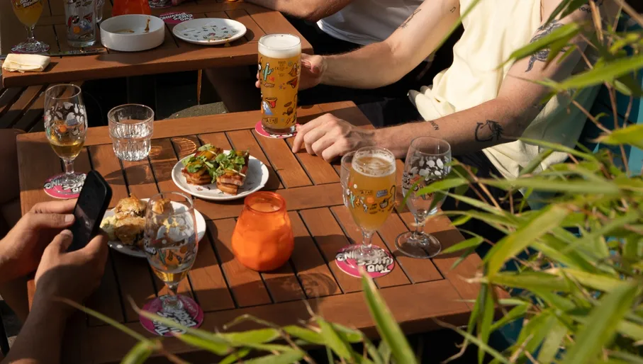 Two Chefs people enjoying beers & food on the terrace