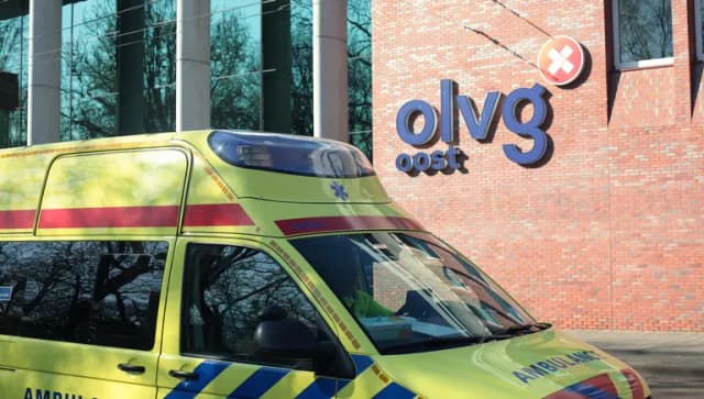 OLVG Oost hospital exterior with ambulance.