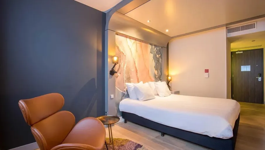 Bedroom at Leonardo Hotel in Almere City Centre