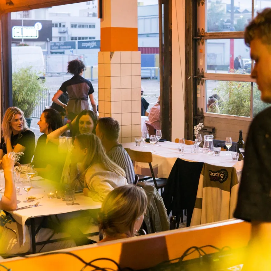 Bar Dancing Multipla DJ playing music while people having dinner