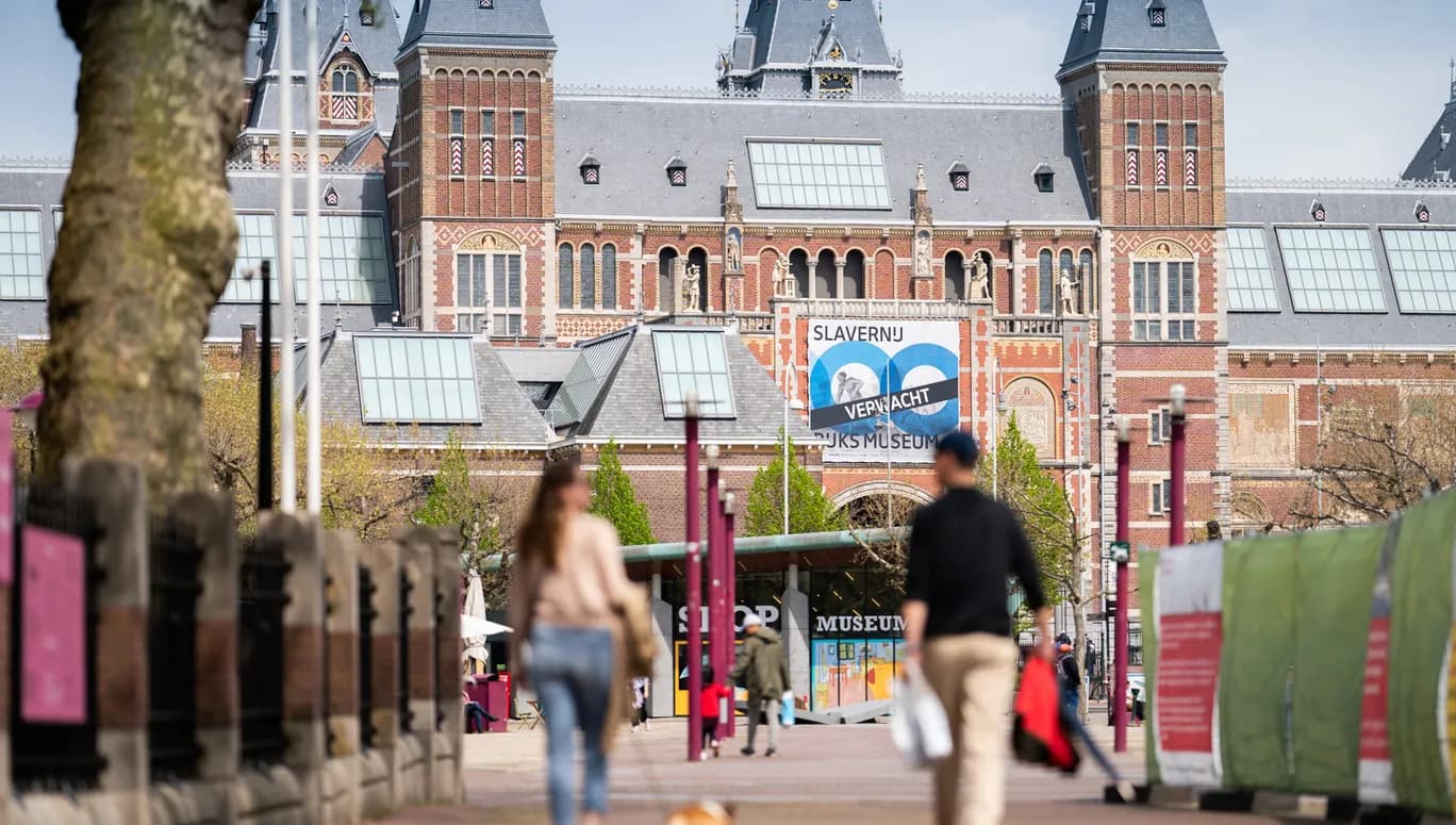 People walking outside Rijksmuseum at Museumplein