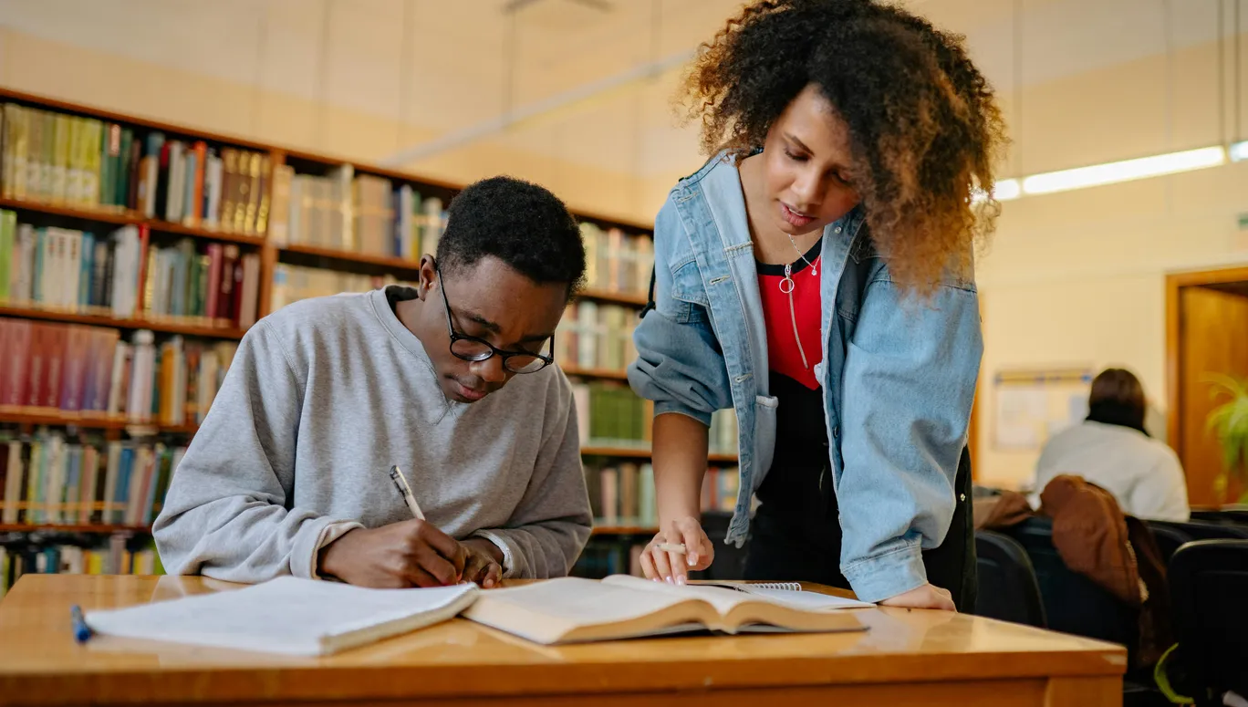 Pexels stock photo with two school children teens