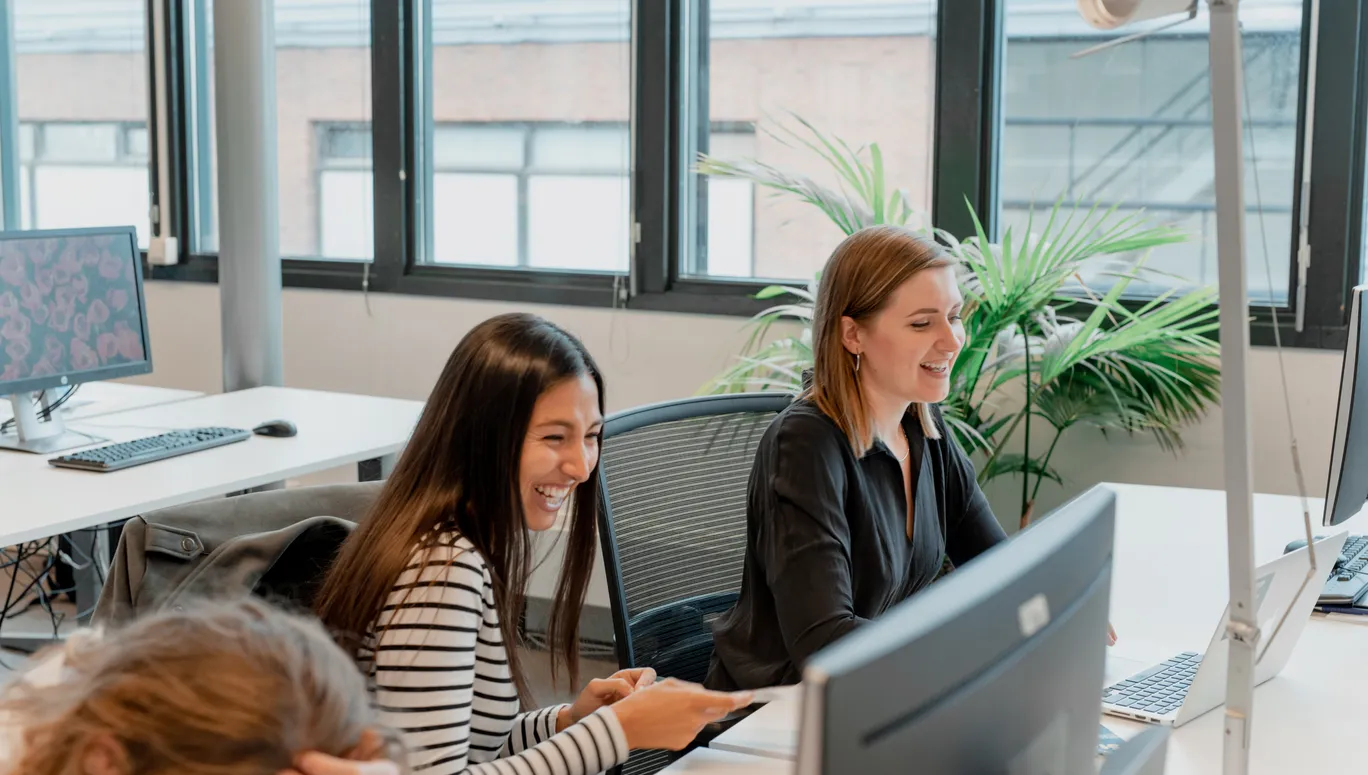 Alexandra Belicova and Kriya Mehta at the office