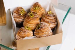 Pastries in a box at SAINT-JEAN bakery.