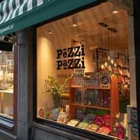 Exterior of Pezzi Pazzi bookstore on Slijkstraat in Weesp