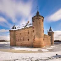 Muiderslot Castle in the snow in Winter
