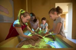 Kids playing with exhibit at Museum Schokland