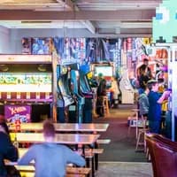 Gaming hall Blast galaxy in NDSM with kids playing arcade games