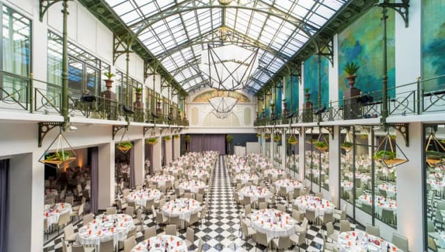 Wintergarden meeting room with banquet setting at Anantara Grand Hotel Krasnapolsky.