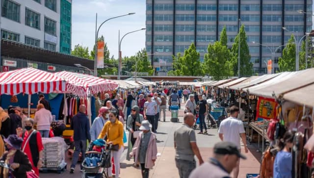 People shopping at market