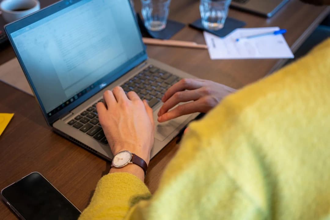 A business man working on his laptop.