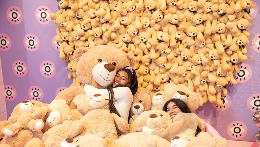 WONDR Experience kids hugging stuffed bears