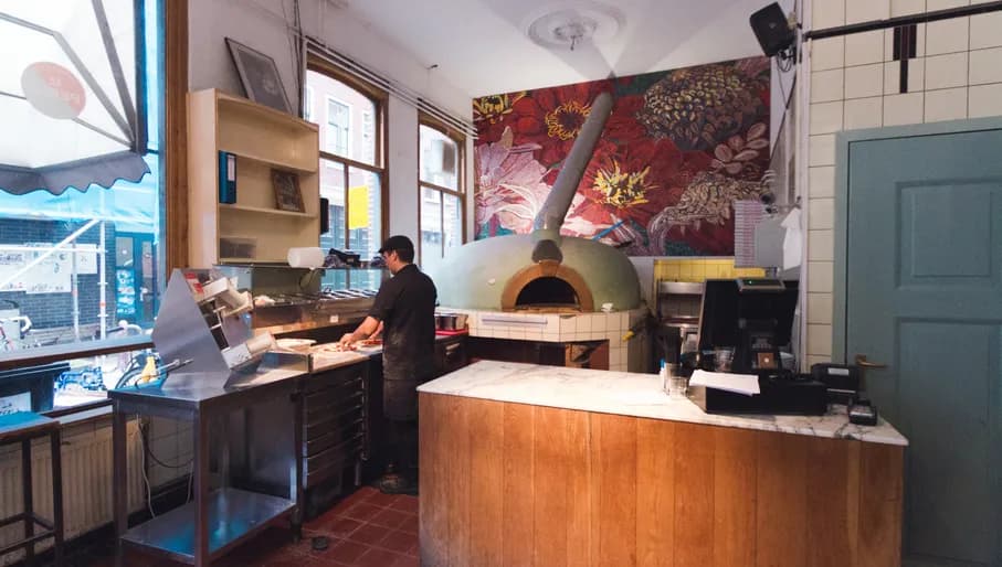 Chef in La Perla pizza kitchen