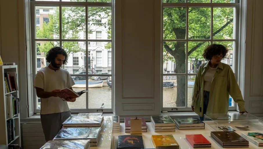 A couple in the museum shop of Huis Marseille.