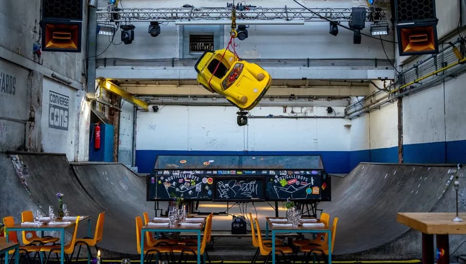 Skatecafé interior with tables and skating rink