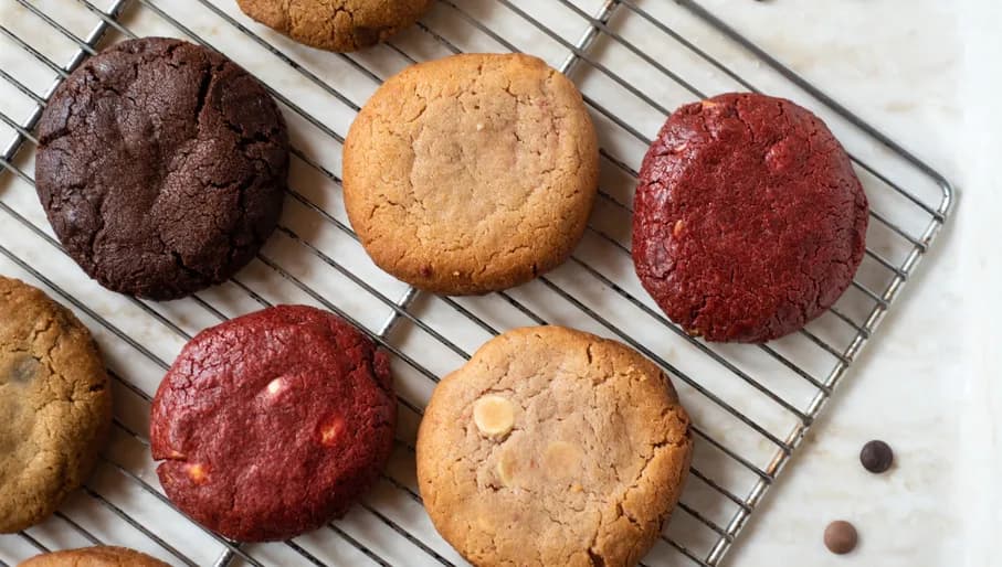 Baked cookies on a tray from Melly’s Cookie Bar
