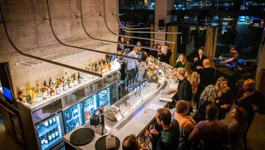 NEXT NDSM people hanging out at the bar