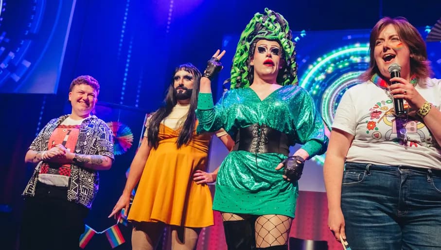 Drag performers and comedians on stage during Boom Chicago Comedy Festival