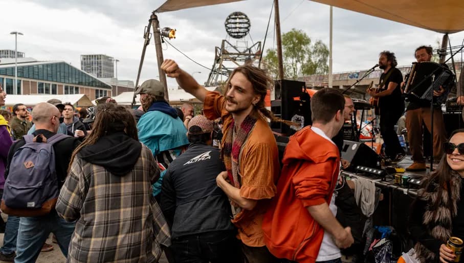 People partying at NDSM Vrijhaven on King's Day 2024.