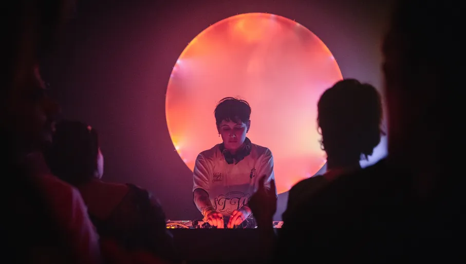 Radio Radio DJ playing music and people dancing