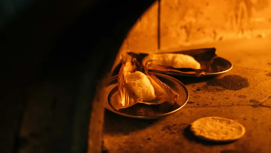 NELA signature dishes made on open fire