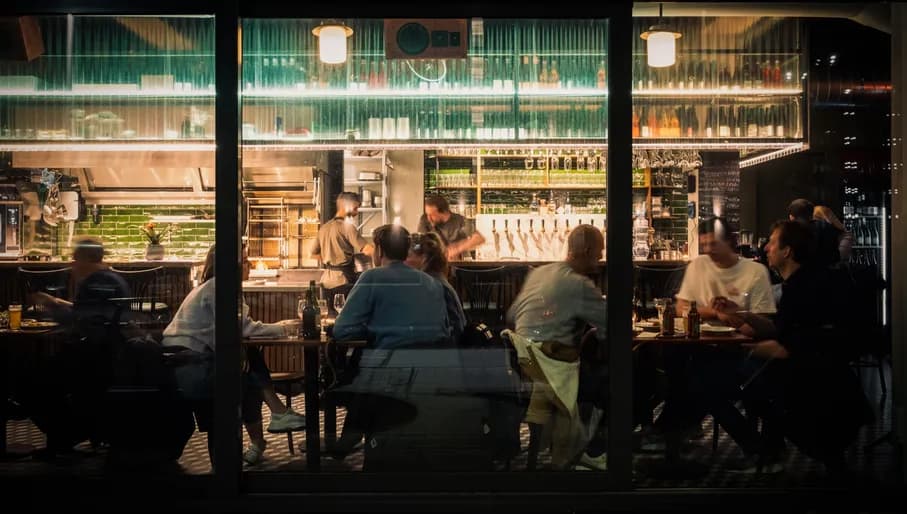 Pelusa people having dinner inside