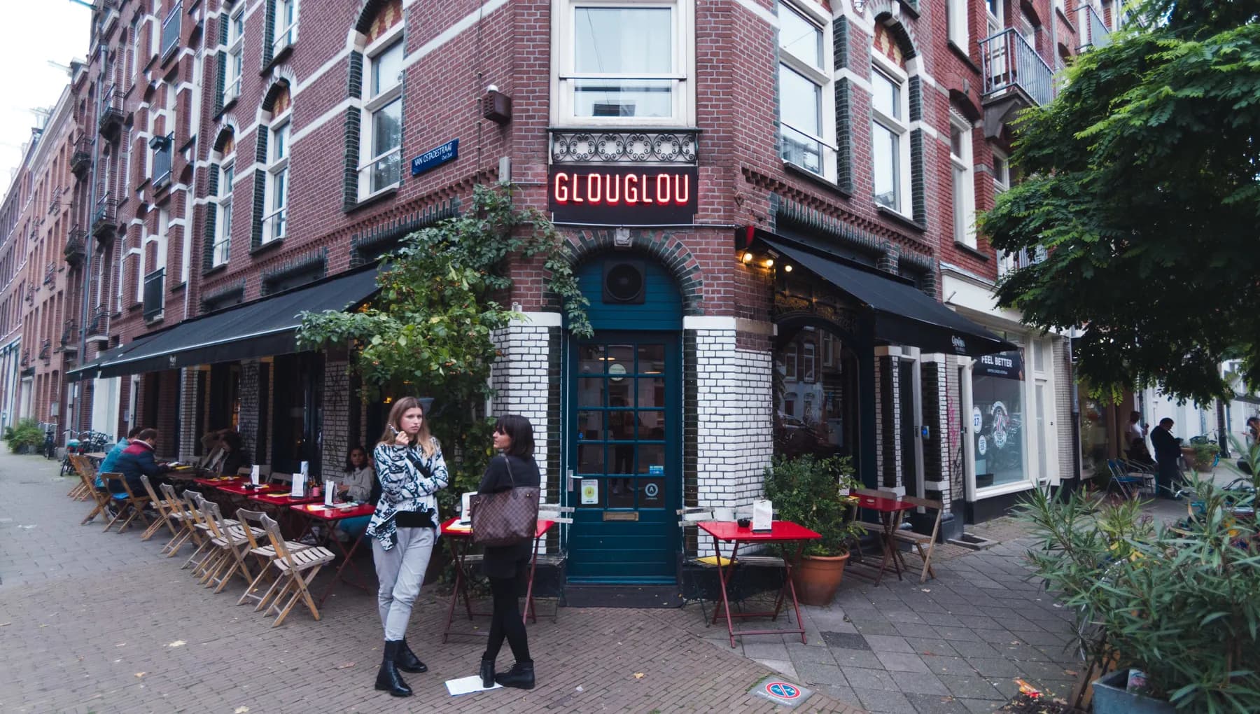 People standing outside GlouGlou wine bar