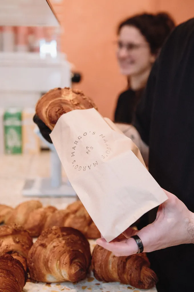 Packing croissants at Margo's vegan bakery.