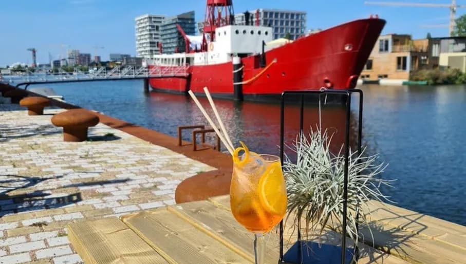 Papa Thang streetfood bistro Aperol Spritz on the terrace next to the water