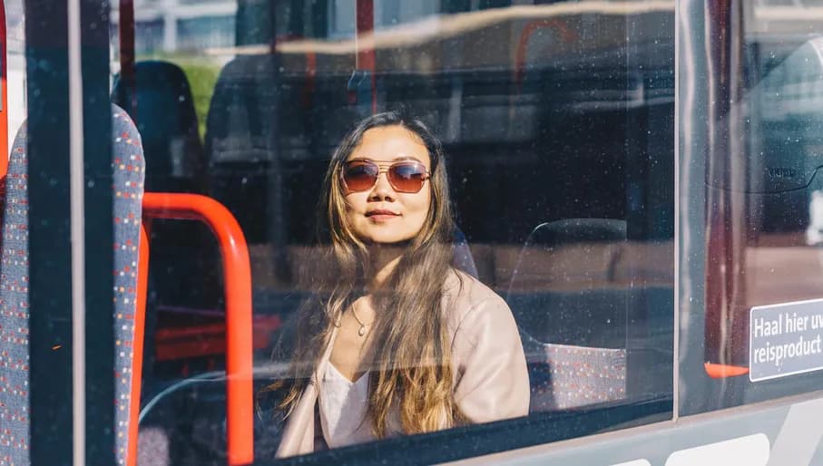 Woman in the bus near Haarlem Central Station.