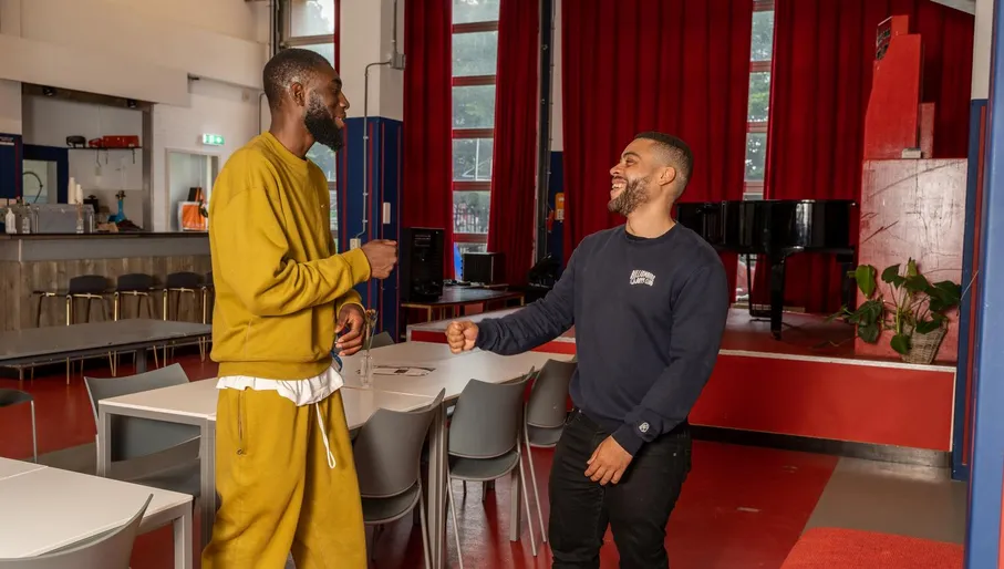 Two men making fun in Kazerne Reigersbos